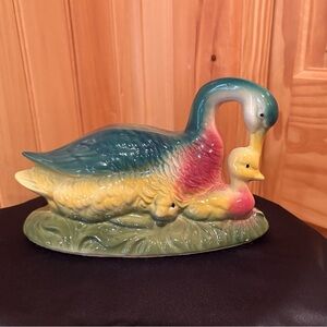Vintage ceramic mother duck with her ducklings